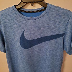 Nike dri-fit women's short sleeve T-shirt size XL 100% polyester.